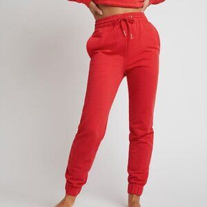 Negative Club Jogger in cherry red, size small